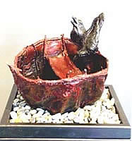 LEO E. OSBORNE BRONZES - CORACLE