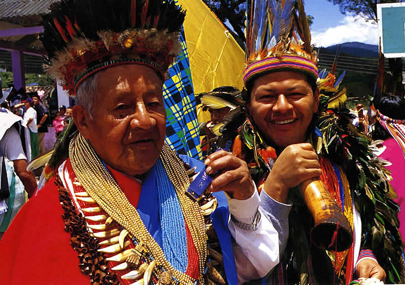 CARLOS JACANAMIJOY WITH HIS FATHER "TAITA" ANTONIO, THE TRIBAL HEALER, AT ATUN PUNCHA FESTIVAL, SIBUNDOY VALLEY, PUTAMAYO